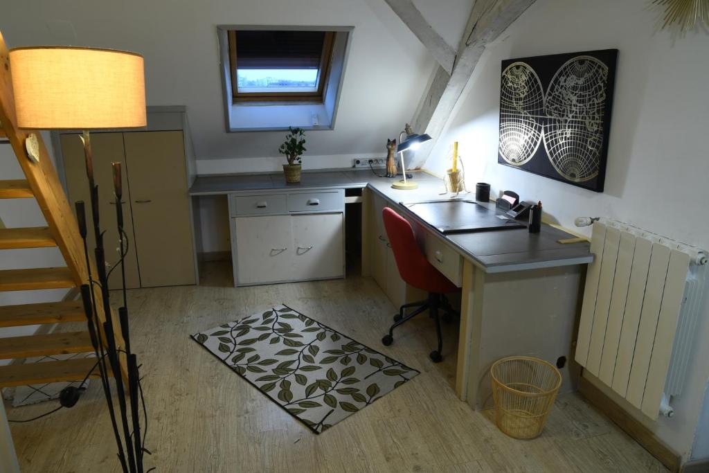Kuchyň nebo kuchyňský kout v ubytování DUPLEX SPACIEUX TOUT CONFORT