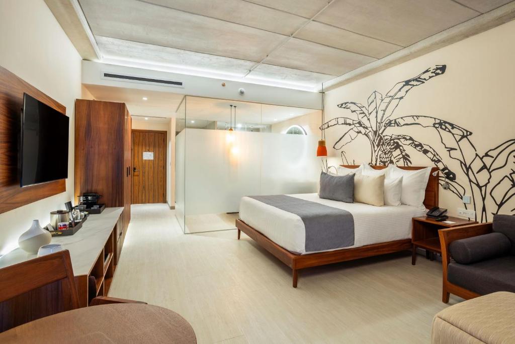 Postel nebo postele na pokoji v ubytování Hyatt Vivid Grand Island Cancun-All Inclusive Adults Only