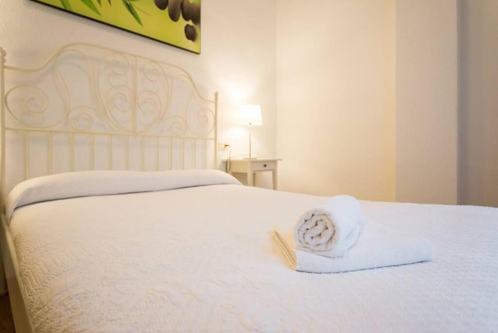 Posteľ alebo postele v izbe v ubytovaní Cathedral Suites