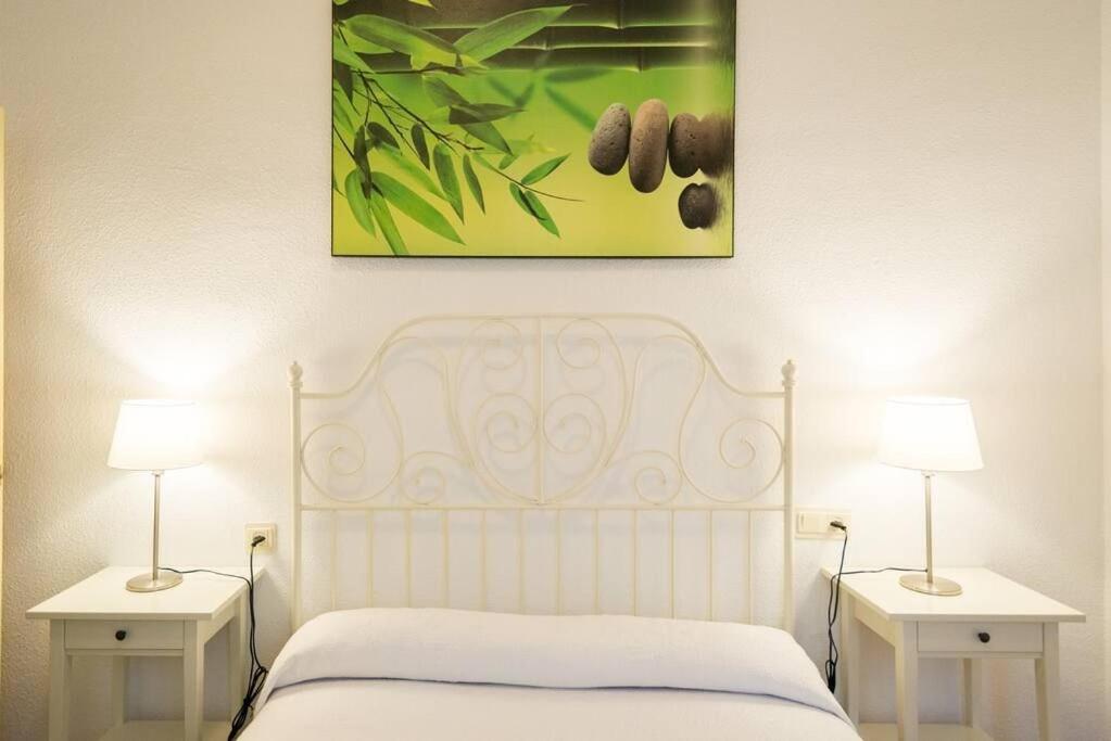 Posteľ alebo postele v izbe v ubytovaní Cathedral Suites