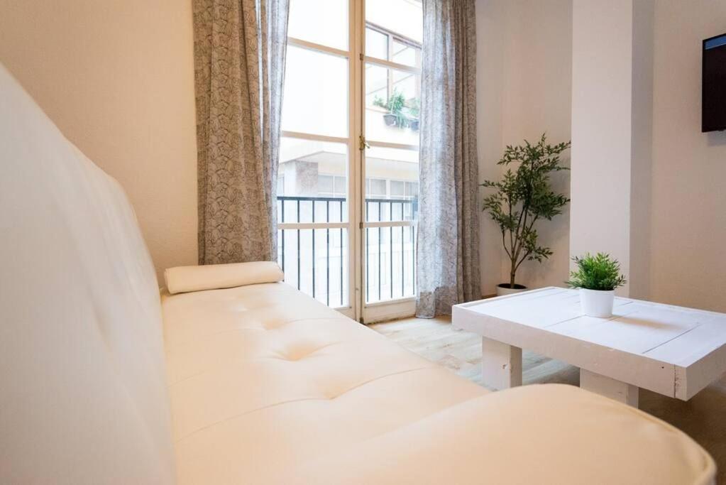 Posteľ alebo postele v izbe v ubytovaní Cathedral Suites