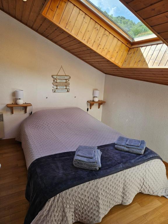 Letto o letti in una camera di Gîte de l'Eau Vive