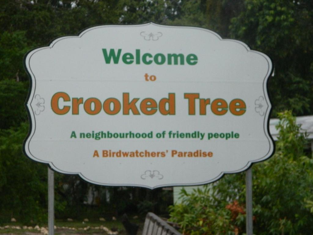 a sign that says welcome to a crooked tree at Becks Bed & Breakfast in Crooked Tree