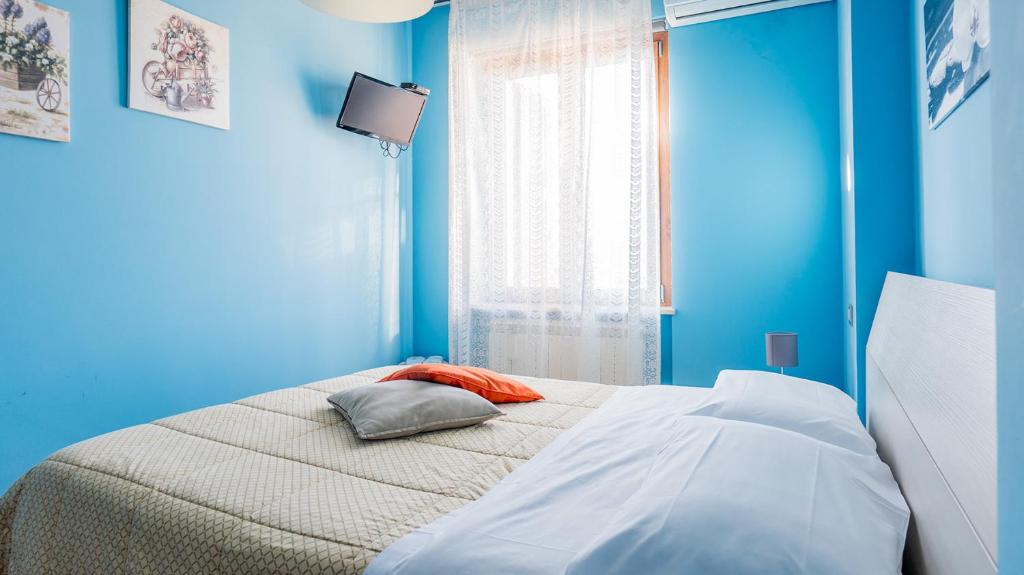 Posteľ alebo postele v izbe v ubytovaní Bed and Breakfast Torre Polidori