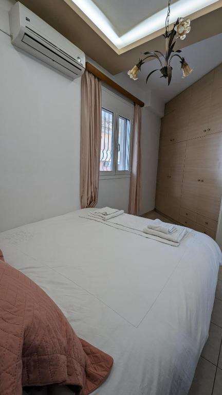 Postel nebo postele na pokoji v ubytování Kouriton apartment is an ideal place to relax