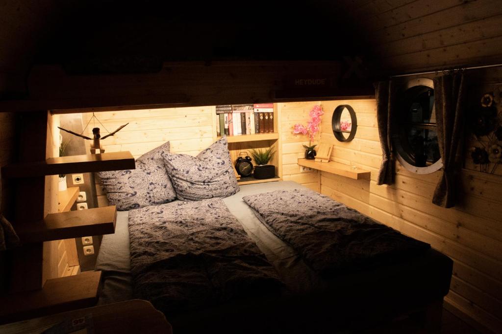 Postel nebo postele na pokoji v ubytování Röhrencamp Schöten/Apolda