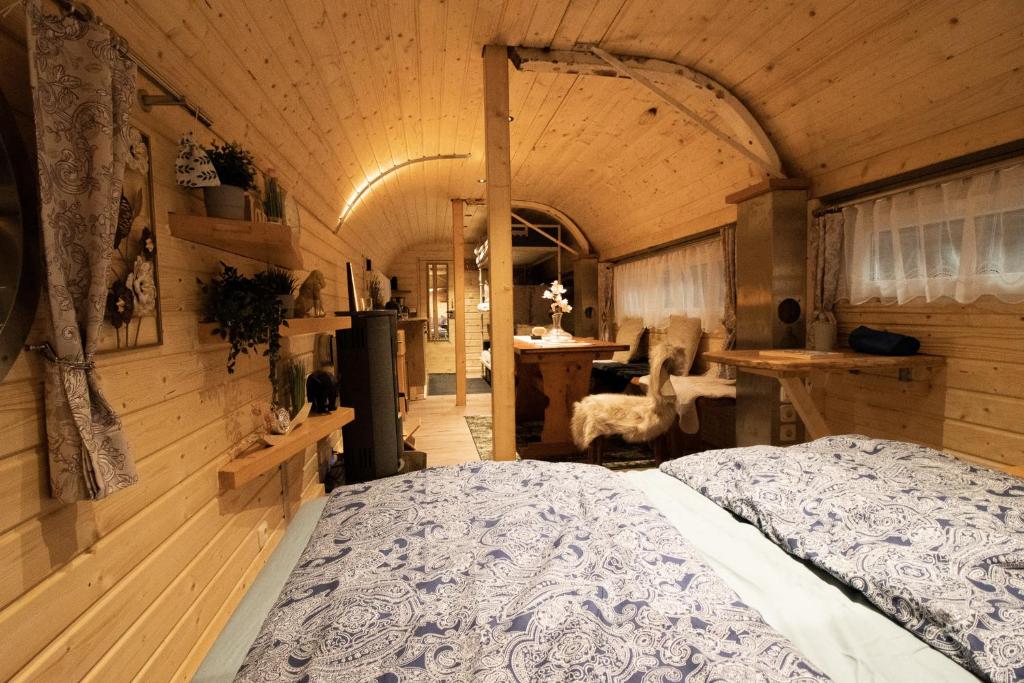 Postel nebo postele na pokoji v ubytování Röhrencamp Schöten/Apolda