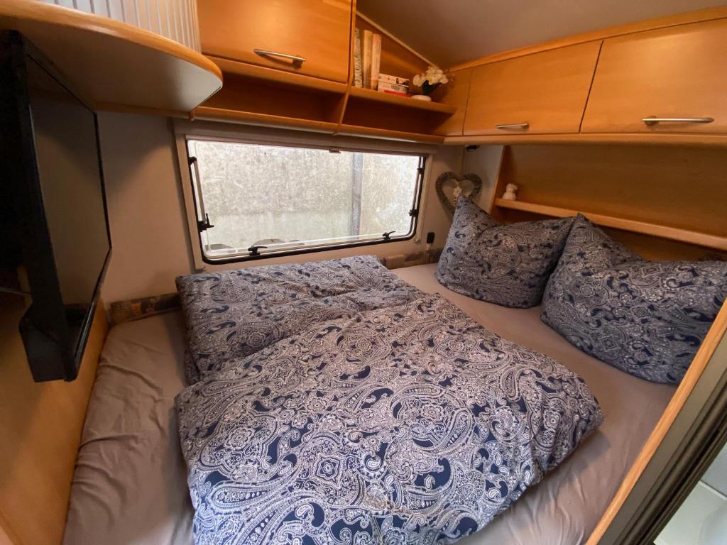 Postel nebo postele na pokoji v ubytování Röhrencamp Schöten/Apolda