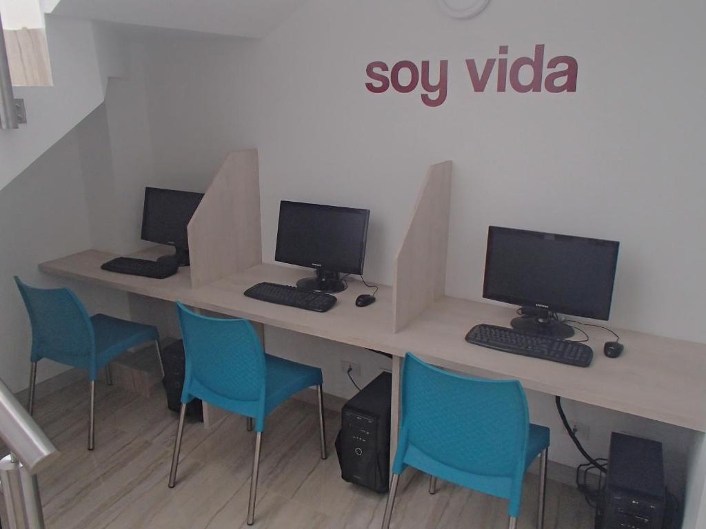 TV a/nebo společenská místnost v ubytování Hotel Sixtina Plaza Medellin