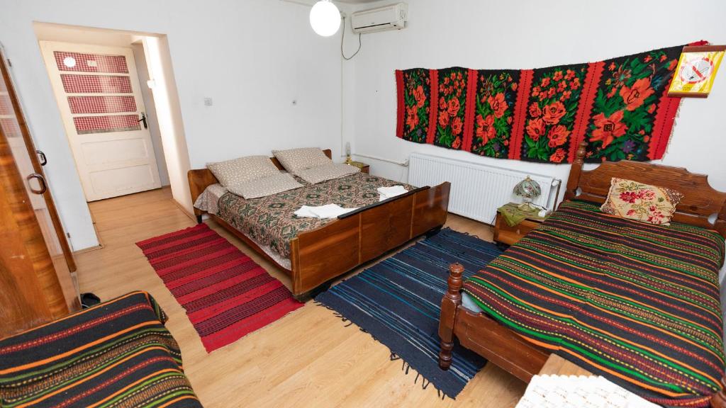 Postel nebo postele na pokoji v ubytování Etno Apartmani ''Vlaška kuća''