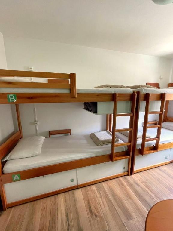 Postel nebo postele na pokoji v ubytování Jardim Botânico House