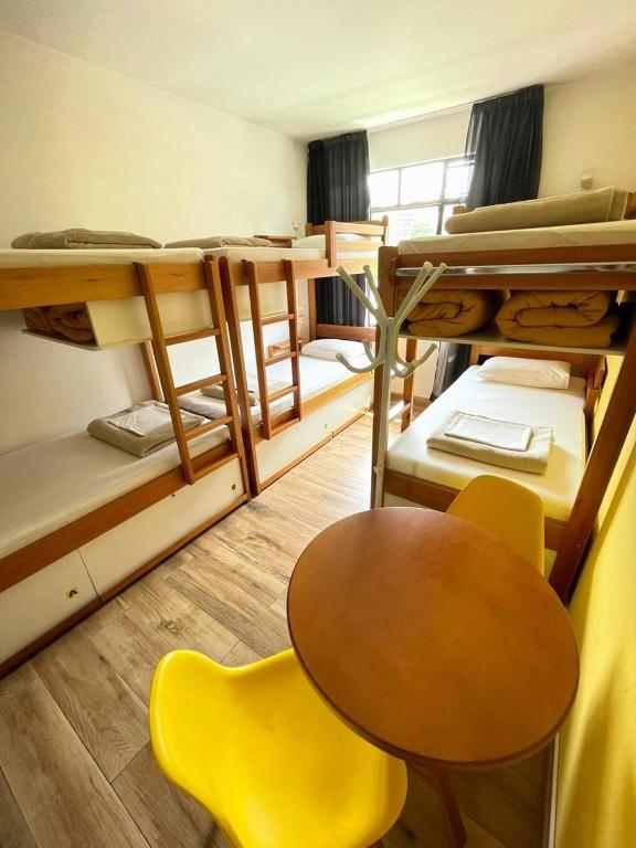 Postel nebo postele na pokoji v ubytování Jardim Botânico House