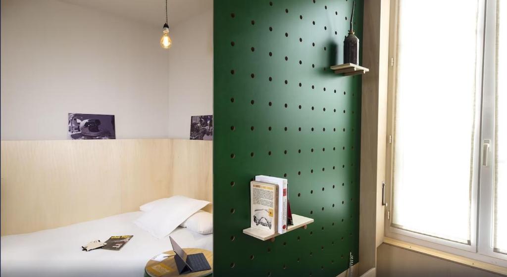 Postel nebo postele na pokoji v ubytování The Originals City Hotel Artyster Clermont Ferrand