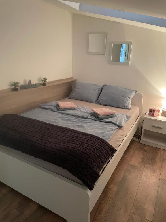 Postel nebo postele na pokoji v ubytování Apartman Una