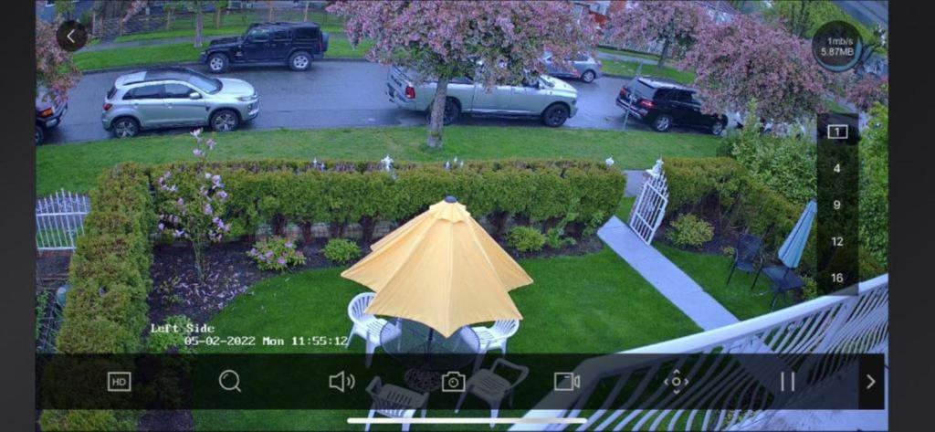an overhead view of a garden with an umbrella at 1Vancouver guest house in Vancouver