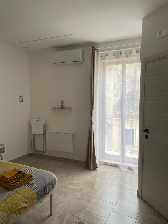 Postel nebo postele na pokoji v ubytování I Parienti Ra Zita