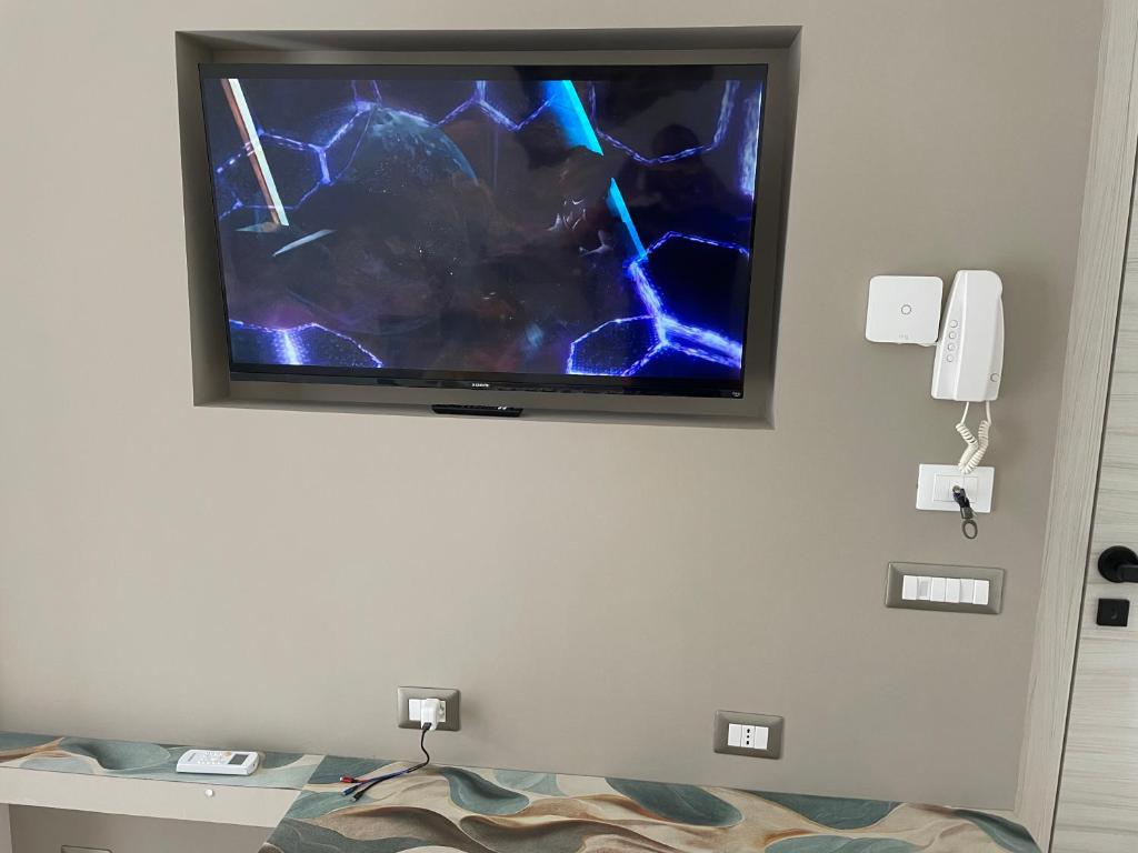 TV a/nebo společenská místnost v ubytování I Parienti Ra Zita