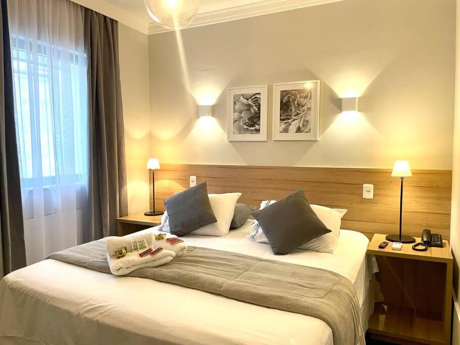מיטה או מיטות בחדר ב-1110 - Flat Suíte Premium Jardim Paulista
