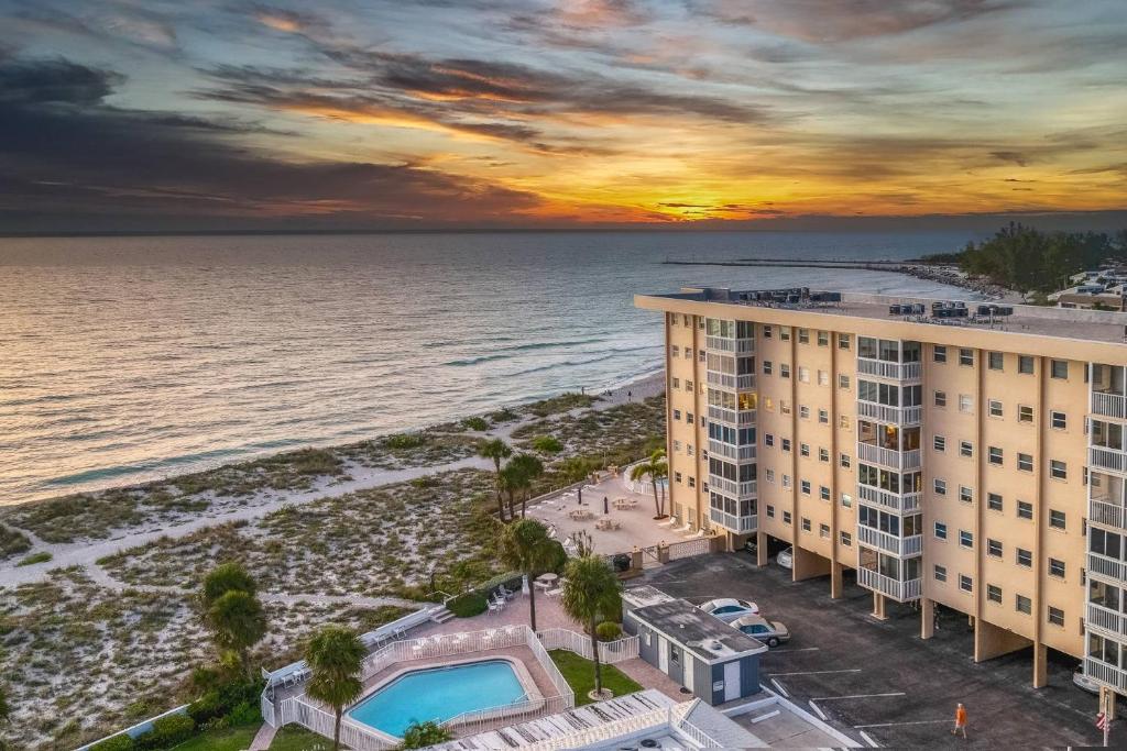 an aerial view of a hotel and the beach at sunset at San Marco 5th Floor with Private Beach in Venice