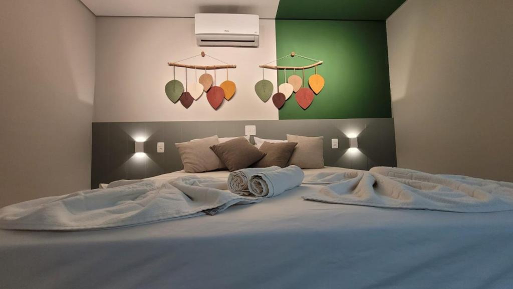 Ένα ή περισσότερα κρεβάτια σε δωμάτιο στο Flat Amarilis Apartamento 202