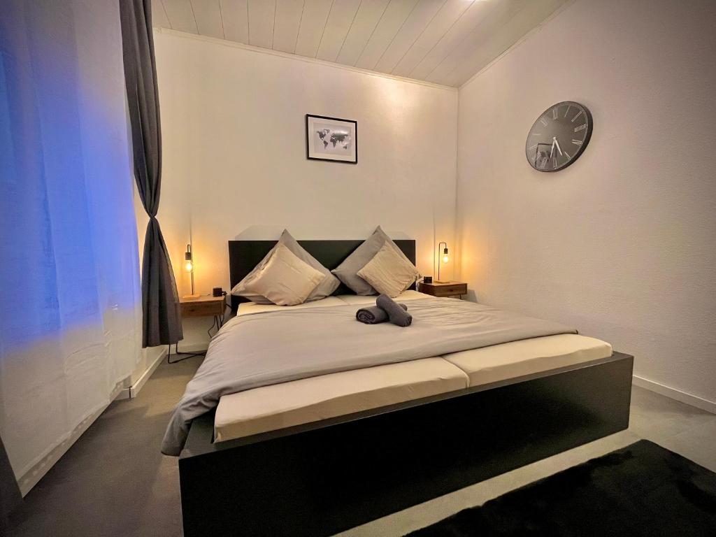 Postel nebo postele na pokoji v ubytování G&G Luxury Apartment am Stadtpark Bendorf