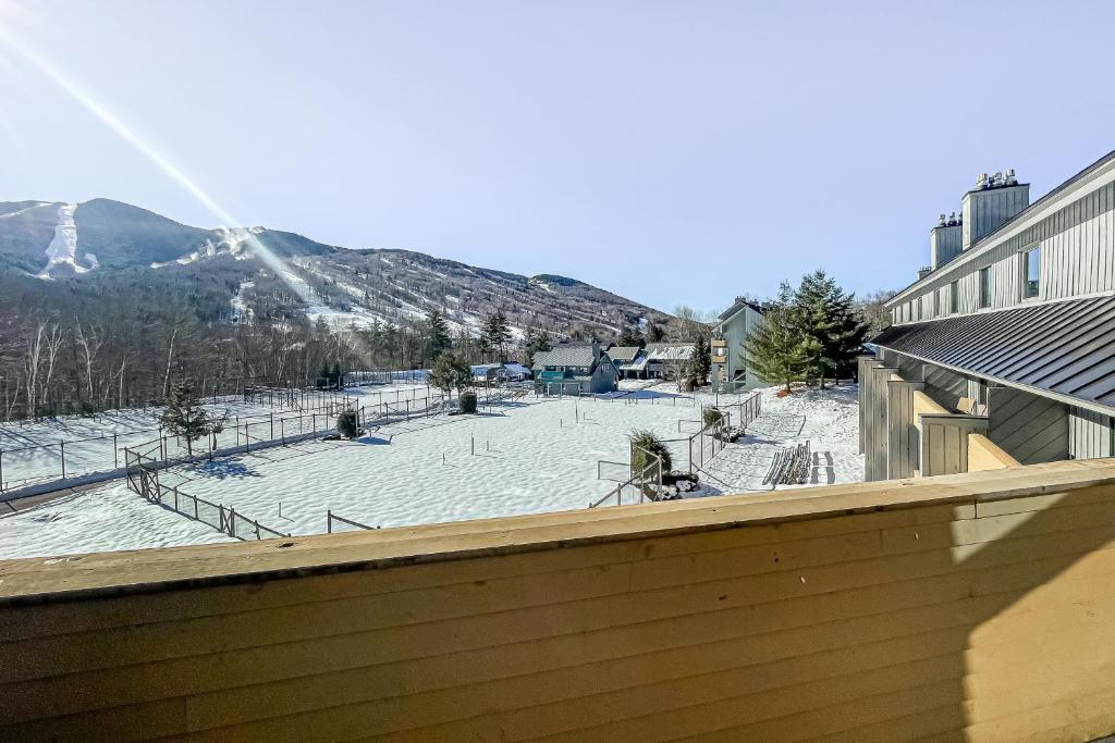 a view of a snow covered slope with a ski resort at Penthouse Suite at Loon Landing in Lincoln
