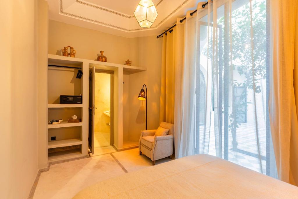 Postel nebo postele na pokoji v ubytování Riad XO