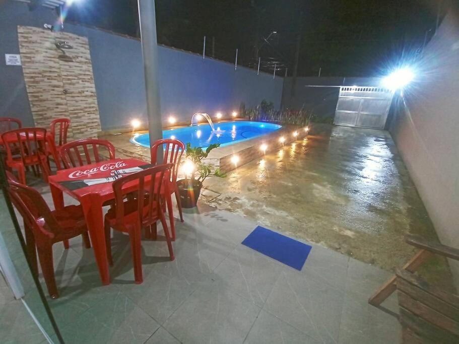 วิวสระว่ายน้ำที่ Casa com piscina, enseada Guarujá sp. หรือบริเวณใกล้เคียง