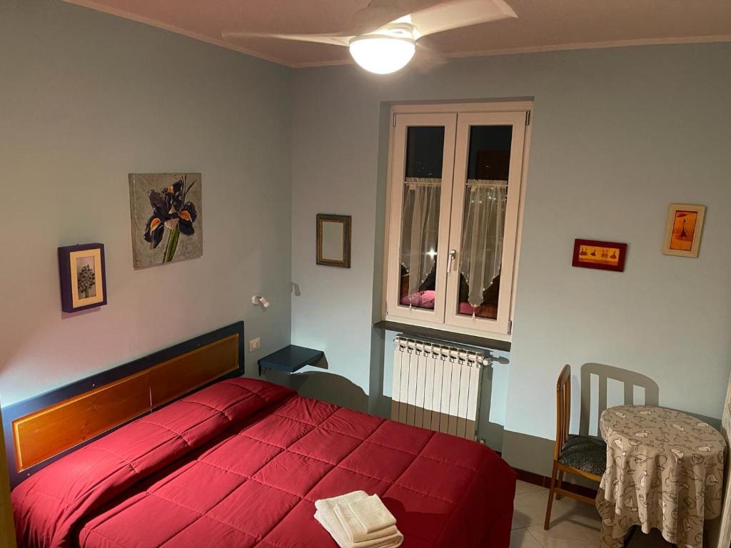 Postel nebo postele na pokoji v ubytování Lattrazionedelgeco