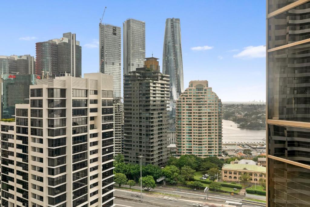 a view of a city skyline with tall buildings at Quay West 2302 Self-Catering in Sydney