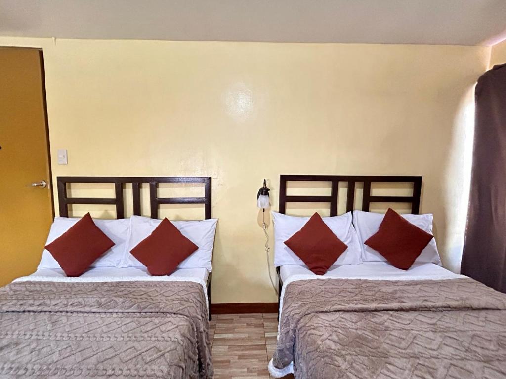 Postel nebo postele na pokoji v ubytování Elegance Guesthouse