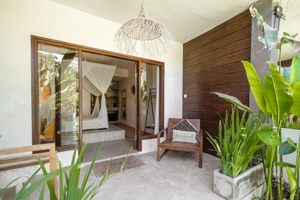 Postel nebo postele na pokoji v ubytování Village Bali