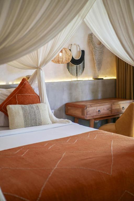 Postel nebo postele na pokoji v ubytování Village Bali