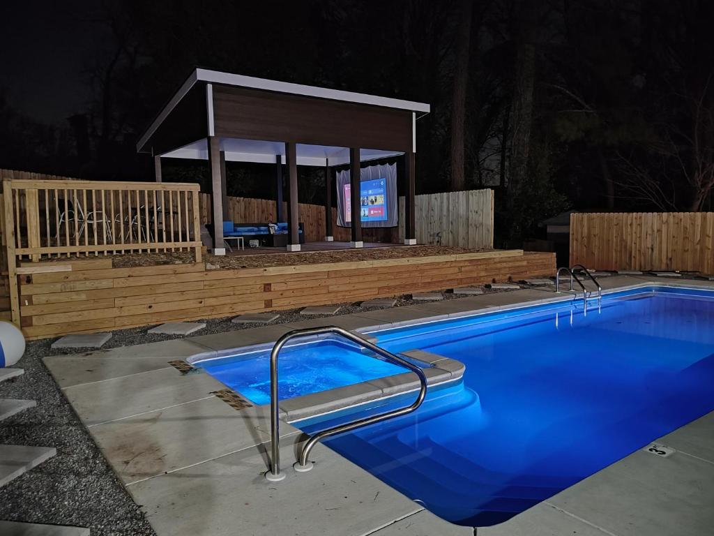 The swimming pool at or close to Rare Find! Private Heated Pool & Spa - Entire Home Near ATL City Center