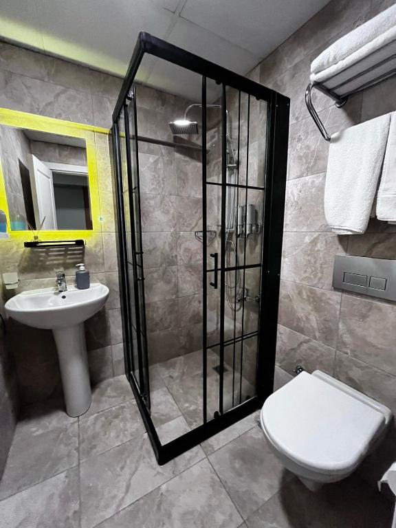 Koupelna v ubytování Naila Hotel
