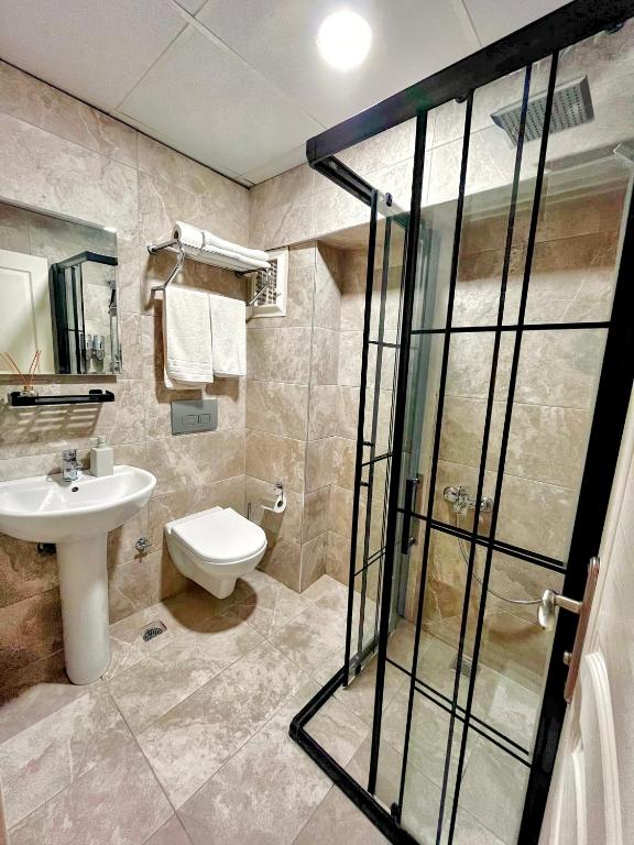 Koupelna v ubytování Naila Hotel