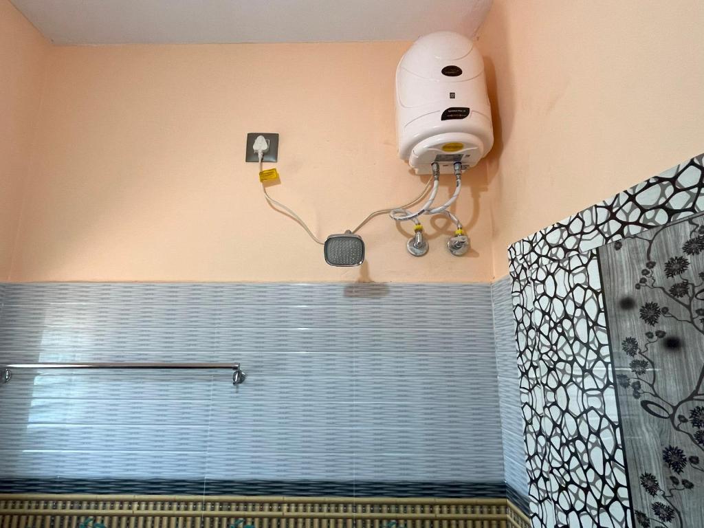 Koupelna v ubytování Sai Ayush Homestay