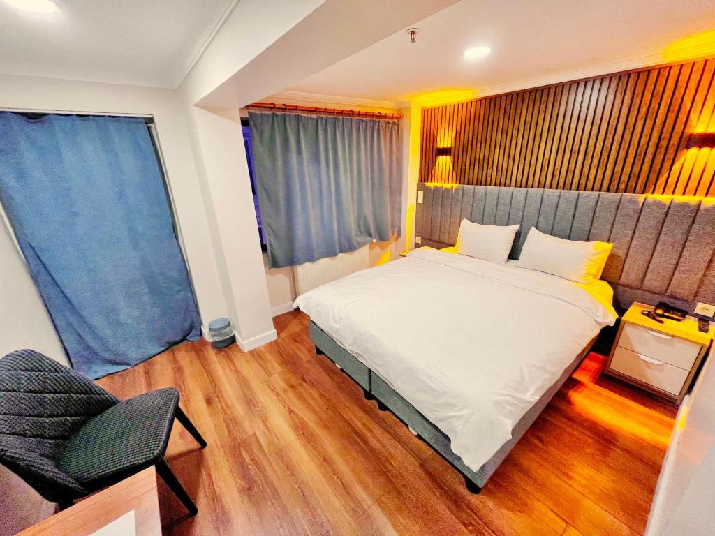 Postel nebo postele na pokoji v ubytování Naila Hotel