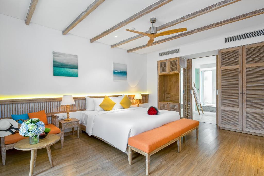 Letto o letti in una camera di Risemount Premier Resort Da Nang