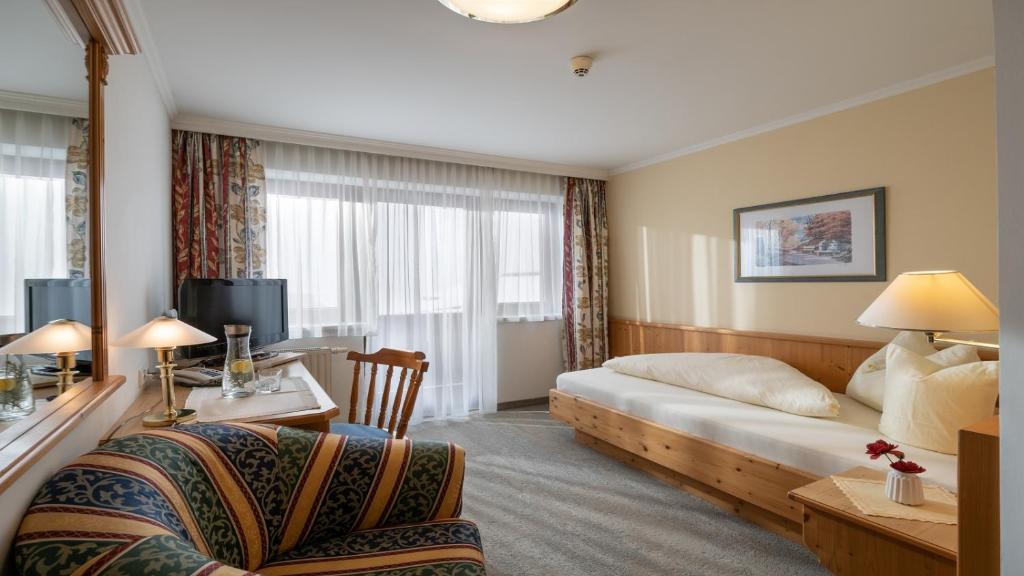 TV a/nebo společenská místnost v ubytování Hotel Andrea