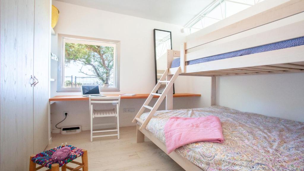Postel nebo postele na pokoji v ubytování A Factoria Beach House by Prishomes