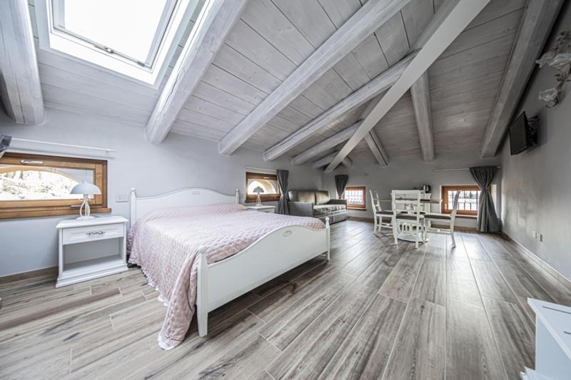 Postel nebo postele na pokoji v ubytování B&B Ca' Bernai