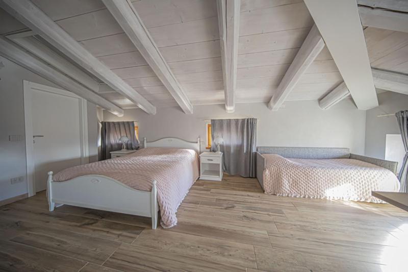 Postel nebo postele na pokoji v ubytování B&B Ca' Bernai