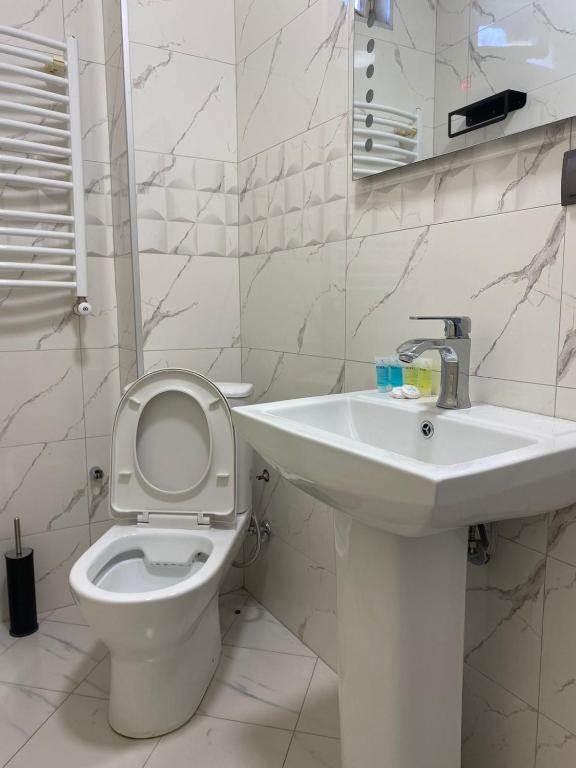 Koupelna v ubytování Boutique hotel RaqWine