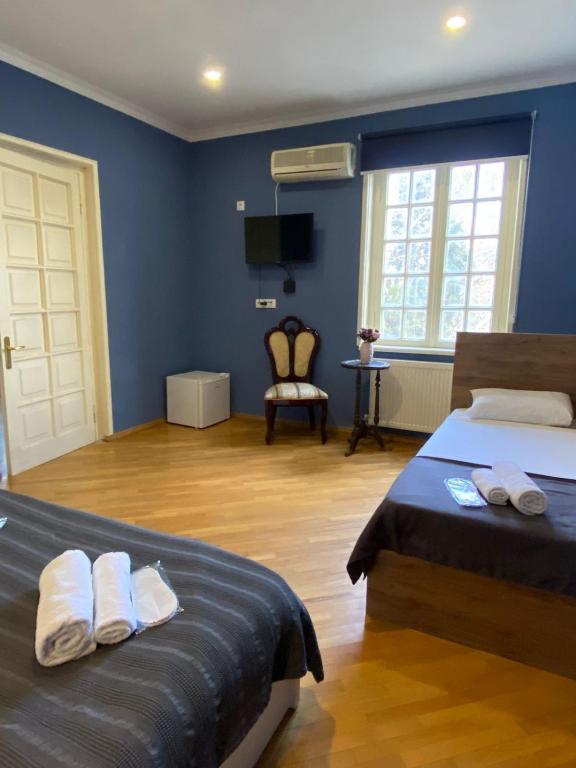 Postel nebo postele na pokoji v ubytování Boutique hotel RaqWine
