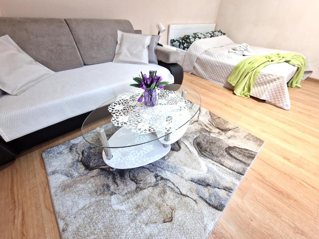 Posteľ alebo postele v izbe v ubytovaní ApartHouse Apartamenty Centrum