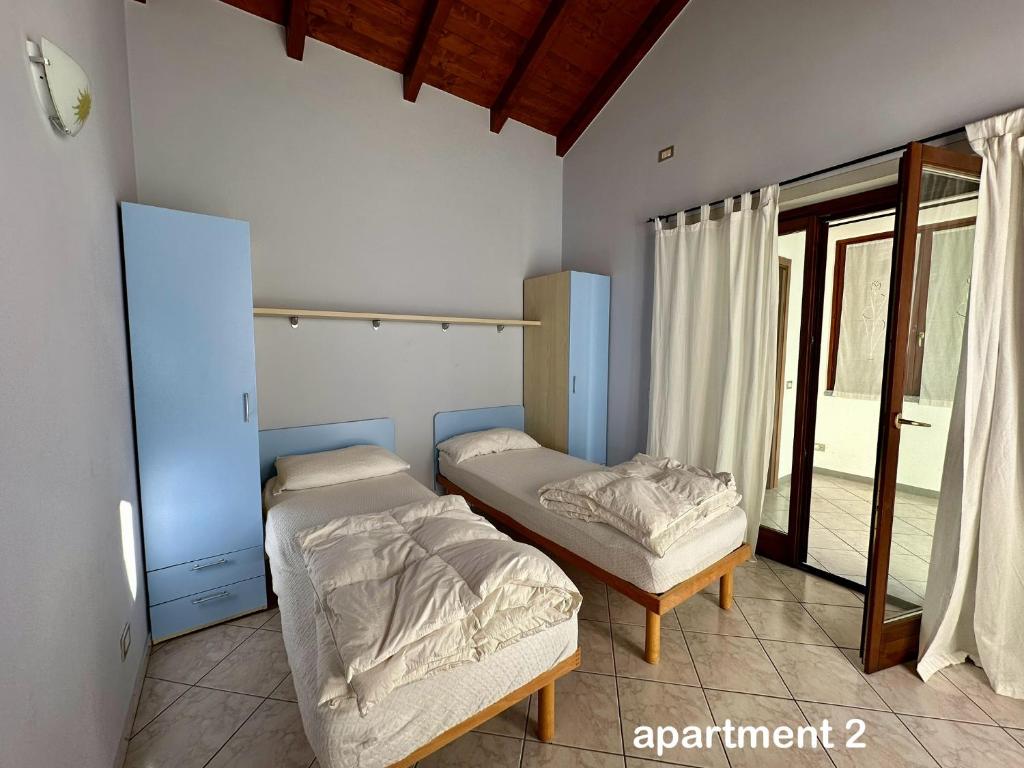A bed or beds in a room at Casa Vista Castelli