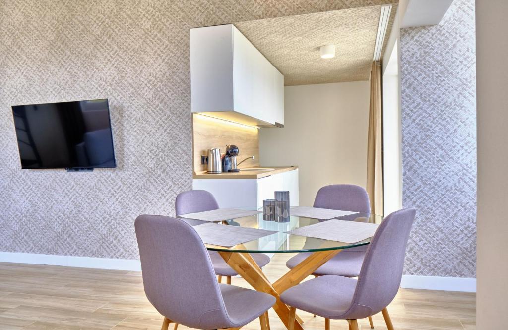 Kuchyň nebo kuchyňský kout v ubytování Apartments Magic box II