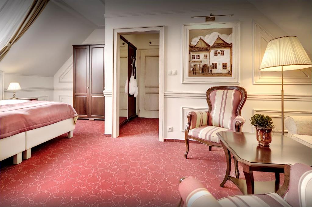 Postel nebo postele na pokoji v ubytování Boutique Hotel Hviezdoslav