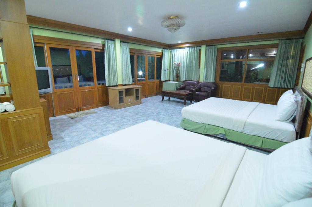 Postel nebo postele na pokoji v ubytování Techno Riverview Resort